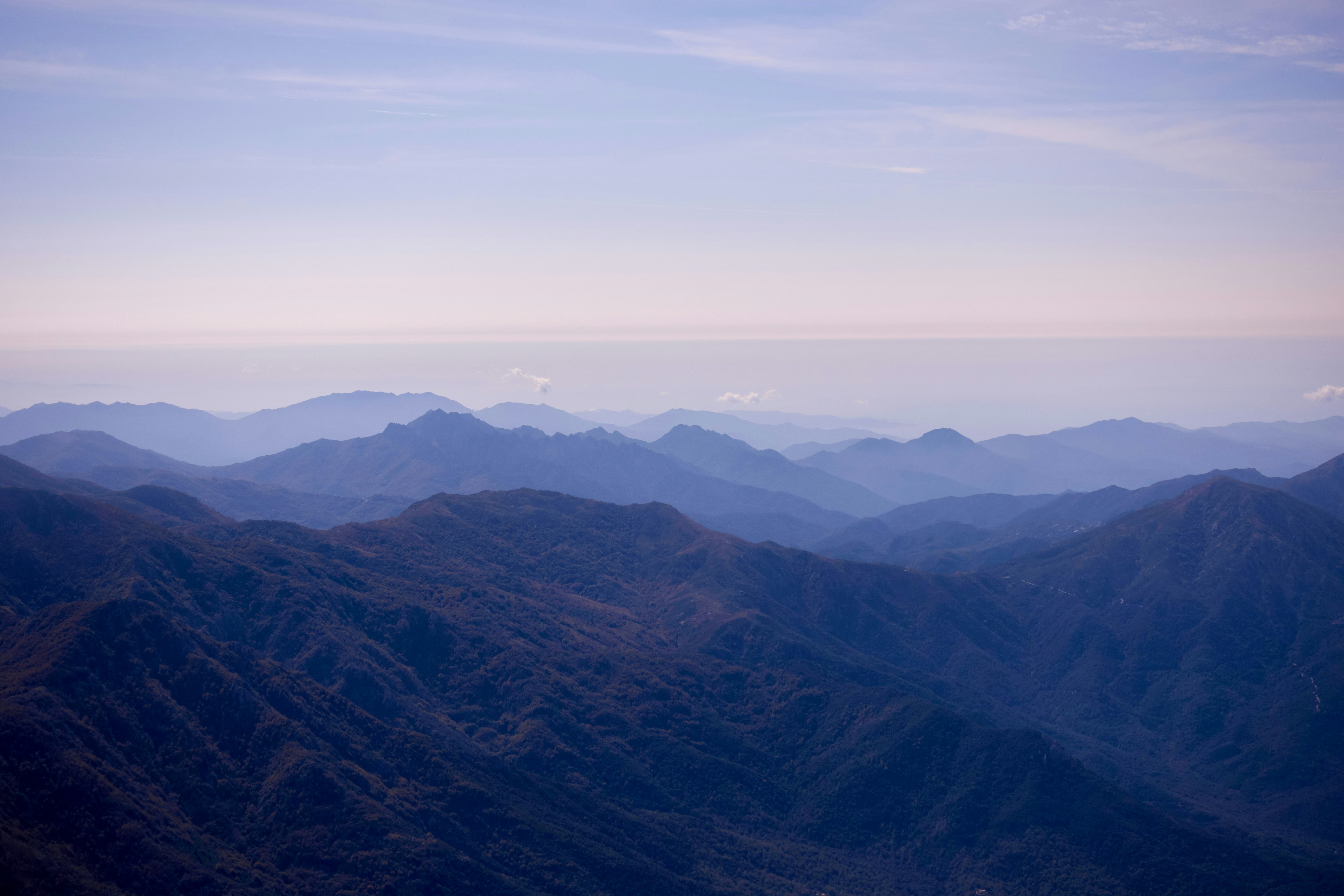 brown mountains under white sky during daytime